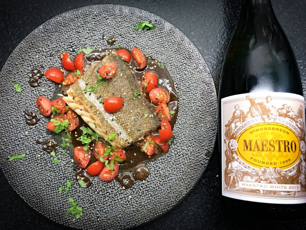 skrei met zwarte knoflooksaus en kerstomaatjes skrei met zwarte knoflooksaus en kerstomaatjes